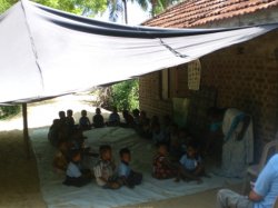 Children's classroom under tarpaulin - Karaveddy, Sri Lanka
